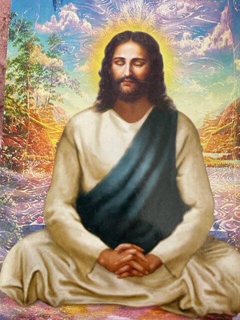 Jesus wearing white dress having meditation